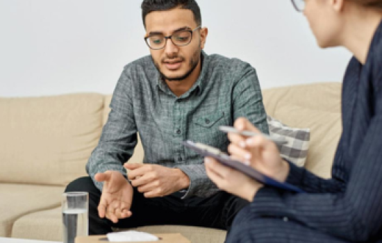 Psychiatric practitioner conducting a medication management consultation